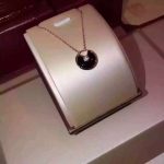 amulette-de-cartier-black-onyx-diamond-necklack-in-yellow-gold-white-gold-and-pink-gold642e92efb79421734881b53e1e1b18b6