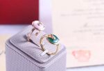 amulette-de-cartier-malachite-ring-with-diamond-in-yellow-gold-white-gold-and-pink-gold6c8349cc7260ae62e3b1396831a8398f