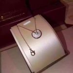 amulette-de-cartier-white-mother-of-pearl-diamond-necklack-in-yellow-gold-white-gold-and-pink-gold642e92efb79421734881b53e1e1b18b6