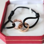 cartier-double-ring-love-bracelet-pink-gold-black-ropeb6d767d2f8ed5d21a44b0e5886680cb9-595×595