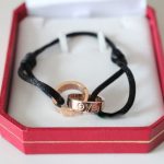 cartier-double-ring-love-bracelet-pink-gold-black-ropeb6d767d2f8ed5d21a44b0e5886680cb9-595×595