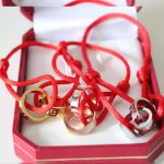 cartier-double-ring-love-bracelet-pink-gold-red-rope19ca14e7ea6328a42e0eb13d585e4c22-1-595×595