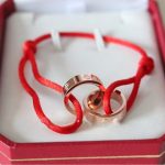 cartier-double-ring-love-bracelet-pink-gold-red-rope19ca14e7ea6328a42e0eb13d585e4c22-1-595×595