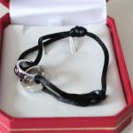 cartier-double-ring-love-bracelet-white-gold-black-roped67d8ab4f4c10bf22aa353e27879133c-1-595×595