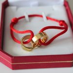 cartier-double-ring-love-bracelet-yellow-gold-red-roped3d9446802a44259755d38e6d163e820-595×595