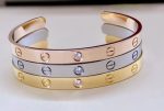 cartier-semi-open-love-bracelet-with-1-diamonds-yellow-gold-white-gold-rose-gold98f13708210194c475687be6106a3b84-595×399