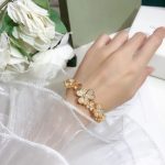 high-quality-van-cleef-arpels-frivole-bracelet-1-7-flowers-yellow-gold-white-gold-rose-gold-with-diamond67c6a1e7ce56d3d6fa748ab6d9af3fd7-595×595