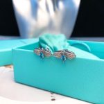 hot-selling-tiffany-co-paper-flower-925-sterling-silver-glowworm-women-diamonds-stud-earrings-purple-blue-crystal3416a75f4cea9109507cacd8e2f2aefc-595×559