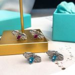 hot-selling-tiffany-co-paper-flower-925-sterling-silver-glowworm-women-diamonds-stud-earrings-purple-blue-crystal3416a75f4cea9109507cacd8e2f2aefc-595×559