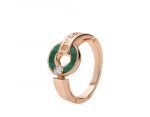 openwork-18k-rose-gold-ring-with-malachite-elements-and-a-round-brilliant-cut-diamond6ea9ab1baa0efb9e19094440c317e21b-595×464