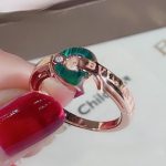 openwork-18k-rose-gold-ring-with-malachite-elements-and-a-round-brilliant-cut-diamond6ea9ab1baa0efb9e19094440c317e21b-595×464