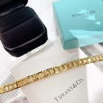 replica-tiffany-t-true-narrow-bracelet-price-t-shaped-hollow-stitching-yellow-gold-band-unisex-online-750752998f13708210194c475687be6106a3b84-595×595