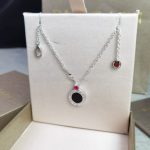 save-the-children-10th-anniversary-necklace-in-sterling-silver-with-onyx-insert-and-a-ruby-best-pricecfcd208495d565ef66e7dff9f98764da