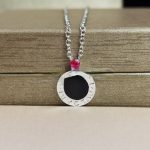 save-the-children-10th-anniversary-necklace-in-sterling-silver-with-onyx-insert-and-a-ruby-best-pricecfcd208495d565ef66e7dff9f98764da