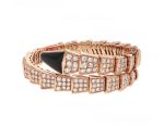 serpenti-viper-one-coil-bracelet-in-18k-rose-gold-set-with-full-pave-diamonds-and-an-onyx-element-on-the-headc4ca4238a0b923820dcc509a6f75849b-595×464