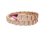 serpenti-viper-one-coil-bracelet-in-18k-rose-gold-with-full-pave-diamonds-and-a-rubellite-on-the-head1c383cd30b7c298ab50293adfecb7b18-595×464