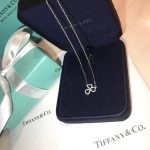 tiffany-co-elegant-style-paper-flowers-three-leaf-clover-open-flower-pendant-womens-diamonds-necklaced9d4f495e875a2e075a1a4a6e1b9770f-595×595