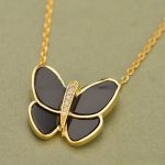 van-cleef-arpels-flying-butterfly-pendant-necklace-yellow-gold-with-black-onyx-diamondsc4ca4238a0b923820dcc509a6f75849b (1)