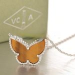 van-cleef-arpels-lucky-alhambra-butterfly-pendant-white-gold-with-tigers-eye-mother-of-pearl8e296a067a37563370ded05f5a3bf3ec