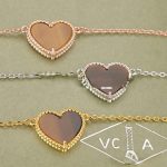 van-cleef-arpels-sweet-alhambra-heart-pendant-yellow-gold-with-tigers-eye-mother-of-pearl6f4922f45568161a8cdf4ad2299f6d23