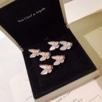 van-cleef-arpels-two-butterfly-earrings-mother-of-pearl-with-diamond-3-colora87ff679a2f3e71d9181a67b7542122c