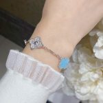 van-cleef-arpels-vintage-alhambra-bracelet-5-motifs-turquoise-and-white-gold-with-diamonds6c8349cc7260ae62e3b1396831a8398f-595×595