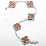 van-cleef-arpels-vintage-alhambra-bracelet-5-motifs-white-gold-with-tigers-eye-mother-of-pearlaab3238922bcc25a6f606eb525ffdc56